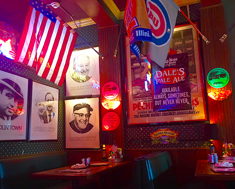 Bar scene with Chicago memorabilia, including Cubs flag 